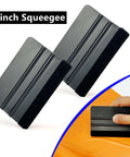 Front view of two black 4-inch vinyl wrap squeegees with felt edge for tint film installation