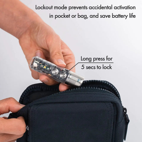 Person holding A28 Gen 2 Pocket Flashlight 1000 Lumens Beast Mode Turbo Beam With Sidelight USB C Rechargeable Light near a black bag