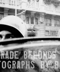 Black and white photo of police with shields in Belgrade, text Belgrade Belongs To Me Photographs By Boogie visible.