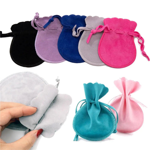 Velvet Jewelry Pouch Set 60 Pack Small Drawstring Bags in assorted colors, ideal for rings, earrings, bracelets, and necklaces.