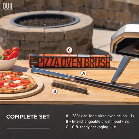 26 Inch Pizza Oven Brush With Stone Scraper Set Includes Two Brush Heads Heat Resistant Stainless Steel Bristles Long Grip Handle displayed with pizza and packaging.