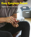 Man using Slick 24-In-1 Mini Screwdriver Set with Eyeglass Repair Kit and Precision Bits for Tiny Screws on glasses.