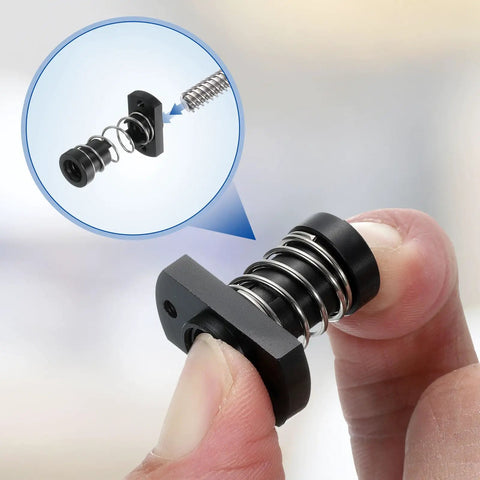 Close-up of 2 Pack TR8x8 POM Anti Backlash Spring Loaded Nut With 2 M3 Holes for CNC and 3D printer, showing black POM material.