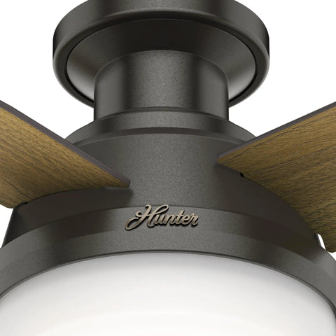Close-up of Beefy 44 Inch Indoor Ceiling Fan With LED Light And Remote Control In Noble Bronze Finish, highlighting central fixture.