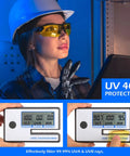 Woman wearing Six Pack Clear Safety Glasses Featuring Ansi Z87 One Certification while using transmission meter indoors.