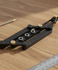 Precision Aluminum Dowel Jig Drill Guide on a wood surface, showing brass bushings and clean design for easy woodworking use.