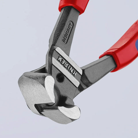 High Leverage Bolt End Cutting Nippers With Multi Component Design For All Wire Types Including Piano Wire Heavy Duty End Cutting Pliers With 64 HRC Cutting Edges, close-up view of cutting edges and red handles.