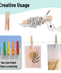 Large Wooden Clothes Pins 2.9 Inch 50 Pack Built Tough Galvanized Coil Springs used to organize earbuds and display art.
