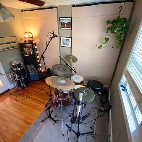 Ditch Junky Foam For This Top Shelf Sound Absorption Sheet Black Sound Dampening Blanket in music studio with drum set.