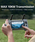 Controller for Atom 2 Fly More Drone Combo With RC PTD 1 showing live view of landscape, highlighting 10KM transmission capability.