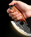 Hand holding a Two Piece Meat Cleaver Knife Set For Cutting Meat And Vegetables, Pro Grade Carbon Steel Cleavers with wood handle.