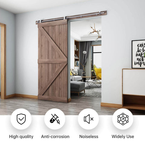 6.6 Foot Top Mount Stainless Steel Sliding Barn Door Hardware Track Kit That Slides Like Butter For 36 To 40 Inch Wide Single Doors Heavy Duty Anti Rust Smooth Quiet Ball Bearing Roller System Easy Install installed on wooden barn door in living room