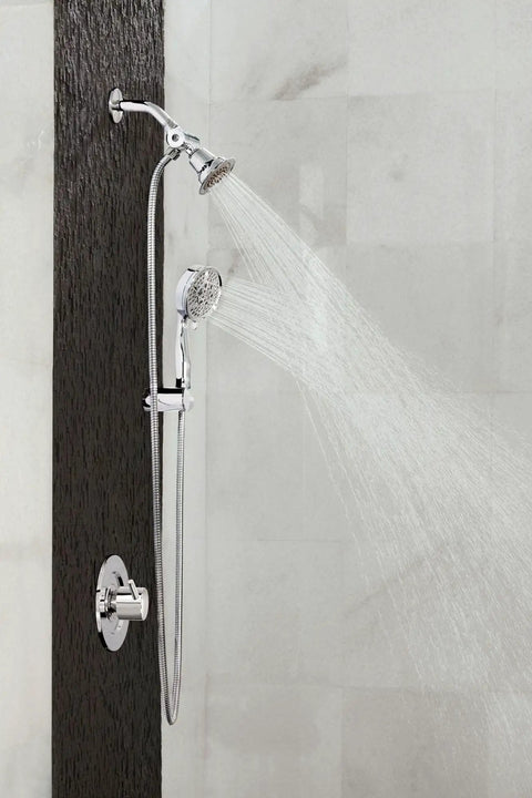 Four Function Eco Performance Handheld Shower With 69 Inch Hose And Wall Bracket, shown in a bathroom, water flowing
