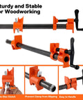 Front view: PONY 2-pack pipe clamp fixtures for 3/4-inch black pipe; orange bodies with black handles.