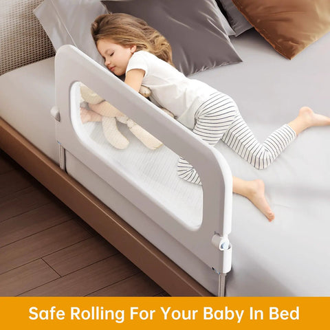 Child sleeping safely with Toddler Bed Rail Guard With 14 Height Adjustable And Swing Down Design For Extra Tall Child Safety.