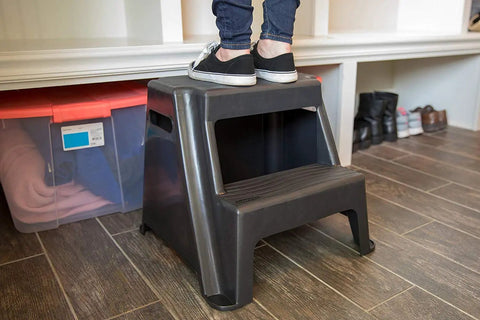 2 Step Molded Plastic Step Stool Lightweight With Slip Resistant Treads And Non Slip Feet Ideal For Kitchen Bathroom Office Or Garage Easy Carry With Cutout Handles Compact And Durable Amazon Exclusive with person standing on it