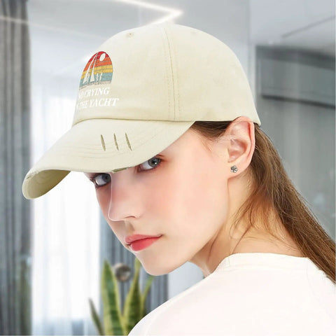 Side view of woman wearing Yacht Vibes No Crying On The Yacht Inspired Cotton Baseball Cap For Men, cream color, breathable design.