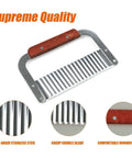 Front view of stainless steel crinkle cutter with wooden handle for slicing vegetables.