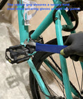 Heavy Duty Bike Pedal Wrench Tool Featuring Tough As Nails Steel Build With Long Non Slip Handle And 6 8 10mm Hex Sockets For No Sweat E Bike Repair Projects in use on a bike pedal.