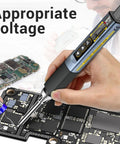 USB Powered Soldering Iron Kit With Fast 3 Second Heat, 95W in use on electronic circuit board, LED display showing temperature