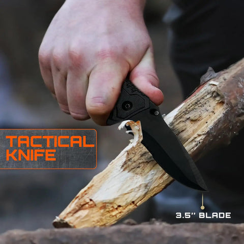 Hand using tactical knife with 3.5-inch blade on wood, part of All-In-One 175-Piece Survival Kit With First Aid for Outdoor Adventures and Emergencies.