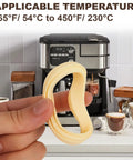 Hand holding a yellow 54Mm Silicone Steam Ring for Espresso Machines Barista Grade Grouphead Gasket Replacement, Breville displayed.