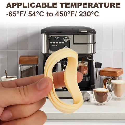 Hand holding a yellow 54Mm Silicone Steam Ring for Espresso Machines Barista Grade Grouphead Gasket Replacement, Breville displayed.