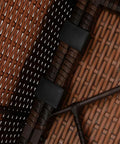 Upgrade Your Patio Game With These Heavy Duty Outdoor Furniture Clips Compatible For Wicker Rattan Sectional Sofa Connectors Universal 8 Piece Quick Fix Replacement Parts close-up of black clips securing wicker rattan base tubes.