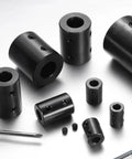 Assorted rigid shaft couplings with hex screws, including Rigid Shaft Coupling With Five Eighth Inch Bore And One And One Quarter Inch Outer Diameter Two Inch Length Black Oxide Carbon Steel Beefy Built With Hex Wrench For 3D Printer Motors And Drive Wheels.