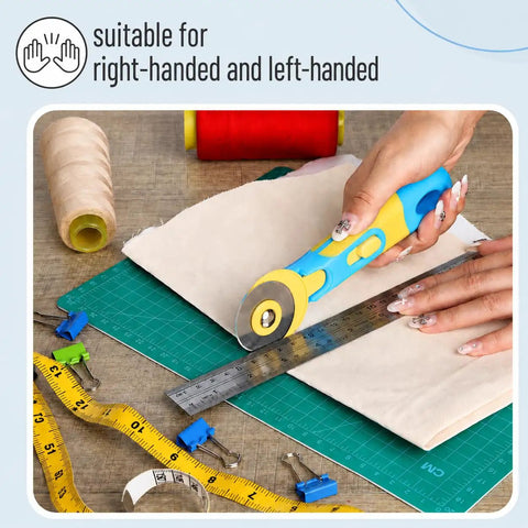 45mm Rotary Cutter Kit With One Extra Blade, Ergonomic Handle, A Real Workhorse With Ultra Sharp Steel Blades For Precise Fabric, Scrapbooking And Craft Cutting, Easy Grip, Smooth Cuts, Great For Quilting And DIY Projects. rotary cutter cutting fabric on mat