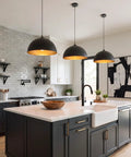 Esfos 11.8" Black and Gold Pendant Lights Kitchen Island, 3 Pack Chandelier over a modern kitchen island.