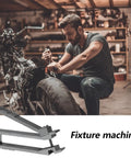 Mechanic working on motorcycle, highlighting fixture machine tool in garage setting.