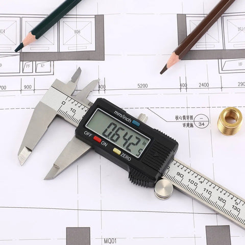 Digital Caliper with Stainless Steel Body, LCD Display, on engineering blueprint showing 6.42 measurement, ideal for DIY