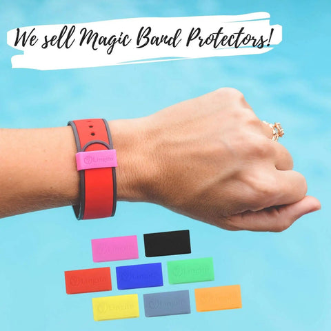 Wrist wearing a red wristband with a pink magic band protector, colorful magic band protectors displayed, blue background