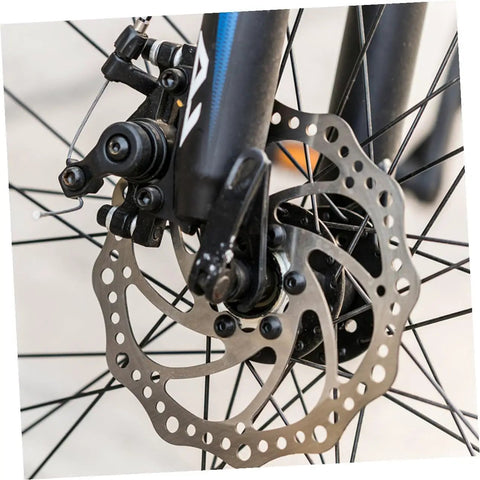 Top Shelf Front And Rear Disc Brake Rotor Kit For Mountain Bikes With Silver Aluminum Build 160mm Diameter Mechanical Setup Dual Knob Adjustment To Legit Crush Every Gnarly Trail front disc brake rotor mounted on a mountain bike.