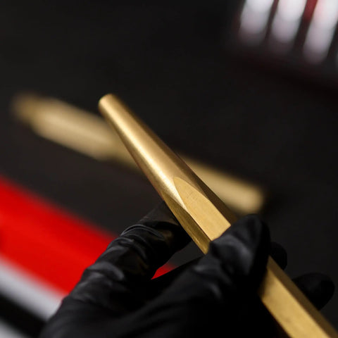 Close-up of Two Piece Brass Drift Pin Punch Set Non Marring Mechanic Chisel Punches For Vehicles Auto Repair Cars Trucks And Vans