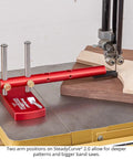 Replacement Pattern Follower Tips For Half Inch Band Saw Template Guide attached to a band saw with wood pieces for precise cutting.