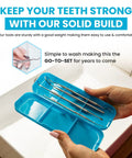 Close-up of At Home Plaque Remover Kit With Stainless Steel Dental Tools in open blue case, held above a sink.