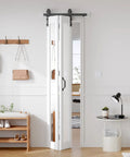 White Bifold Barn Doors 24X84 Inch Featuring Killer Full Length Mirror Easy Glide Hardware Super Solid Frame Smart Space Saver Room Divider in a stylish room.