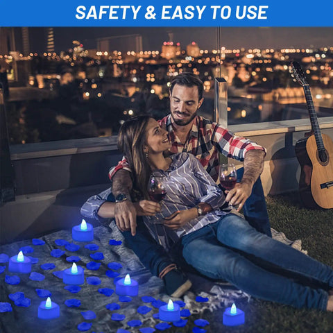 Couple enjoying romantic night with Blue Silk Rose Petals Romantic Night Decor Set With 2000 Pieces And 24 Flameless Heart Shaped Led Candles