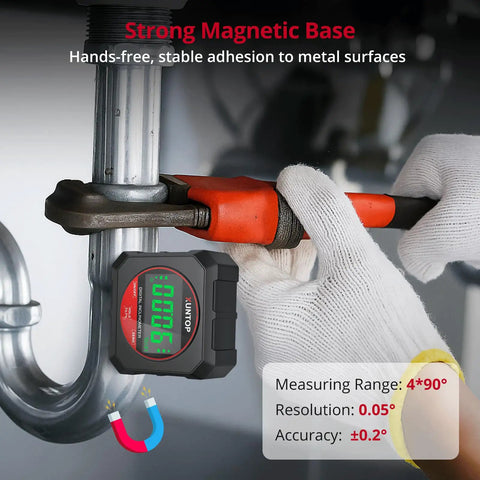 Heavy Duty Digital Angle Gauge With Freakin Precise Readings And Hella Strong Magnetic Backing Optimized For Rapid Framing Layouts And Hassle Free Weekend Projects in use on metal pipe with adjustable wrench.