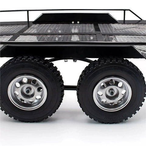 Heavy Duty Metal RC Trailer With Dual Axles And Integrated Suspension showing wheels and frame, compatible with 1/8 and 1/10 scale RC cars
