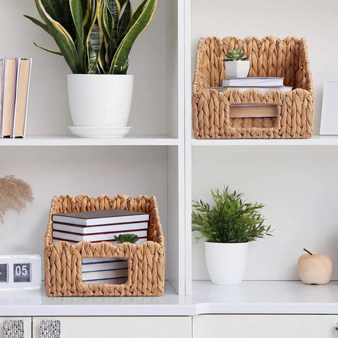 Set Of 2 Scalloped Wicker Storage Baskets With Handles For Food Organization on white shelf with books and plants