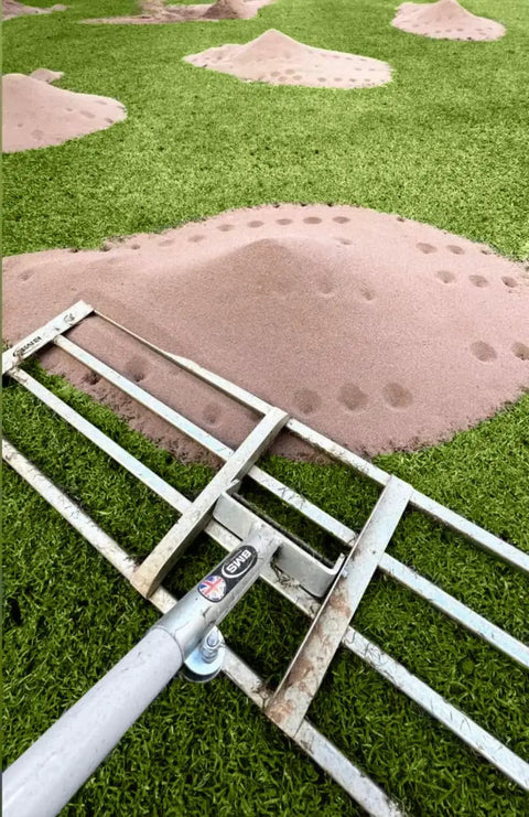 38 Inch Wide Leveling Lawn Rake With Stainless Steel Head And 72 Inch Aluminum Handle Top Notch Heavy Duty Yard Leveler on grass with sand