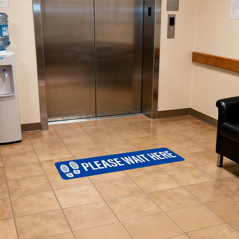 Five Piece Please Wait Here Floor Sign Kit 26 By 6 Inches Self Adhesive Waterproof Vinyl on lobby tile near elevator