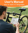 Man reading manual beside bike, Road Ready All In One Brake Bleed Kit For Hydraulic Disc Brakes Compatible With Shimano TEKTRO And TRP Includes 240 Ml Mineral Oil Fluid In Four 60 Ml Bottles Clear Funnel And Simple Step By Step Instructions.