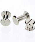 Close-up of silver rivet buttons from Complete 75 Piece Chicago Screw Post Leather Binding Kit for leather crafts.