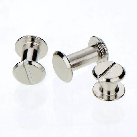 Close-up of silver rivet buttons from Complete 75 Piece Chicago Screw Post Leather Binding Kit for leather crafts.