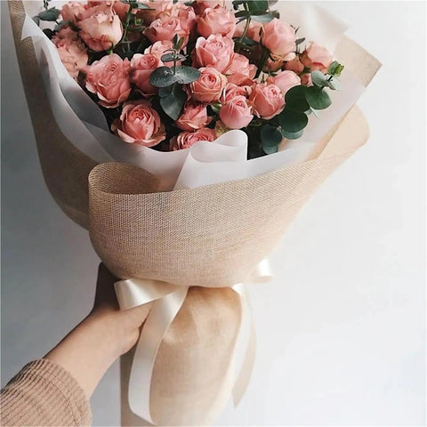 Brown Kraft Tissue Paper 10 Yard Linen Look Wrapping Paper White For Floral Bouquets And Gift Packaging with pink roses.