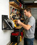 Man using Heavy Duty Wall Mount Tool Organizer for circular saws in garage, space saving holder with powder coated finish